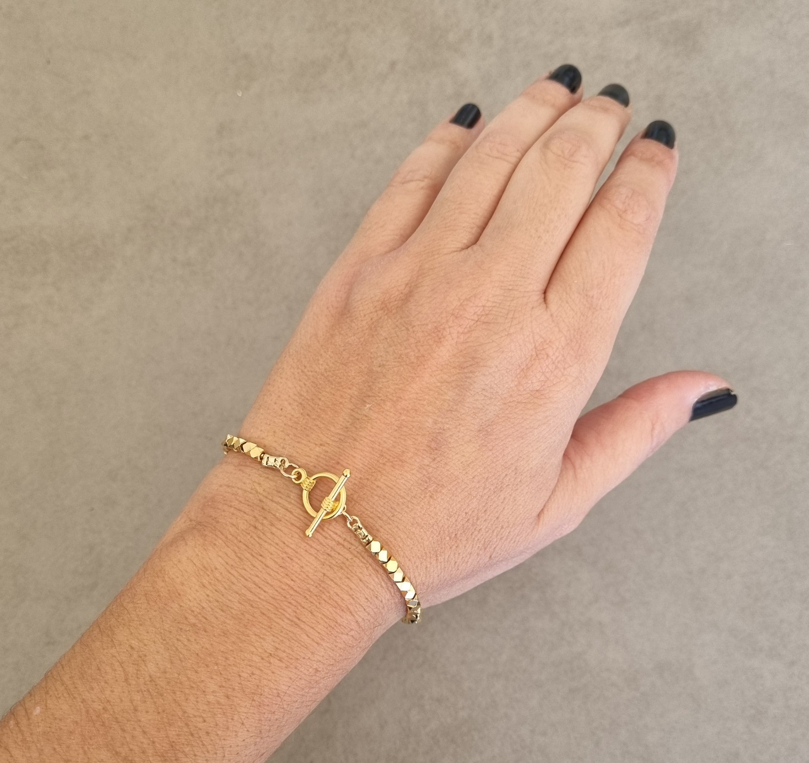 צמיד צינורות זהב מלופף – Hila Assa Jewelry